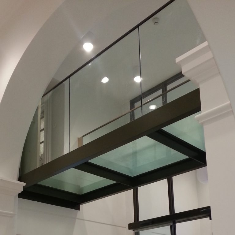 Completed with glass balustrades and glass floor.